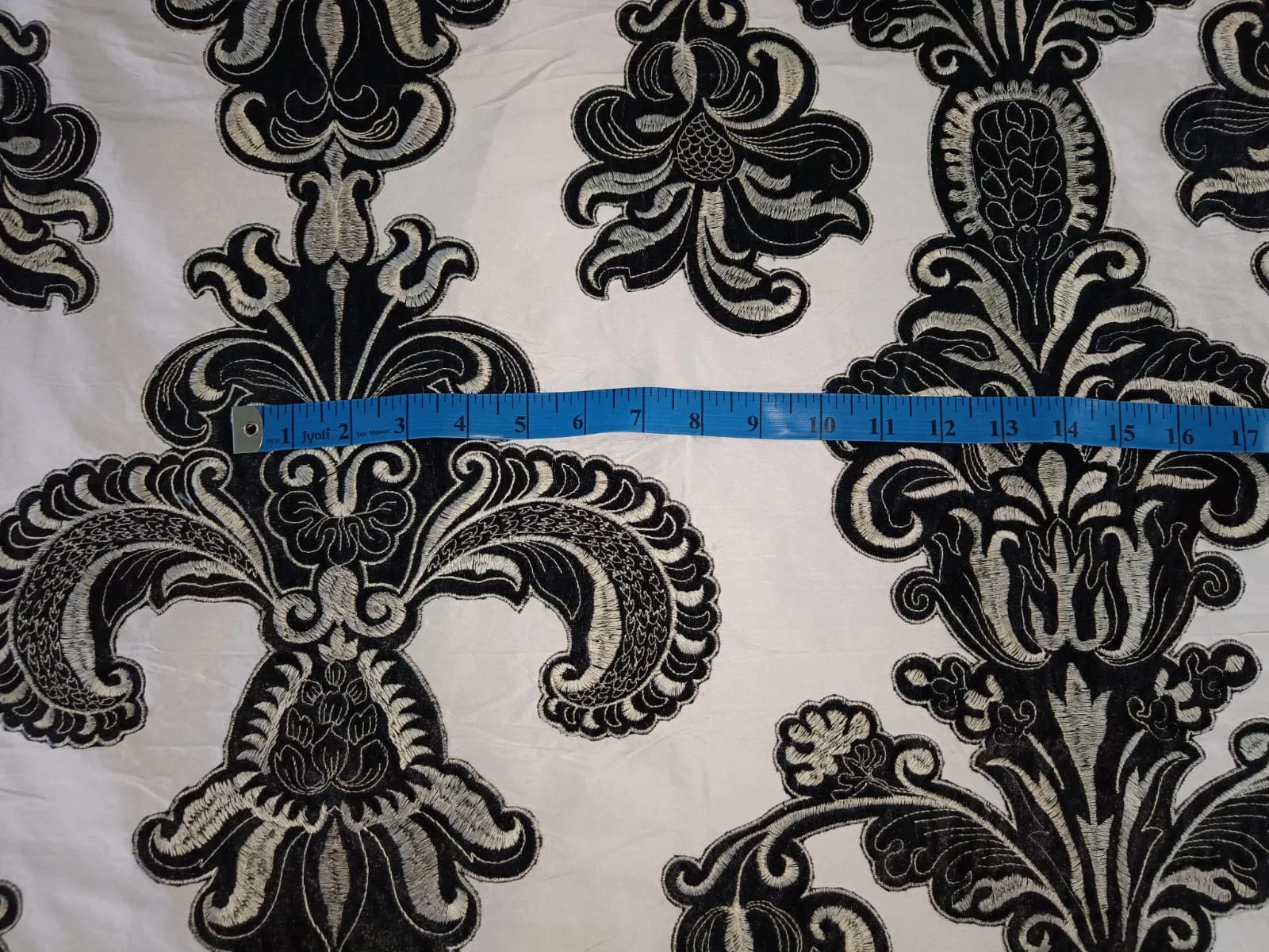 SILK DUPIONI EMBROIDERY REVERSABLE IVORY AND BLACK AND IVORY AND CREAM 54" wide DUP#E12