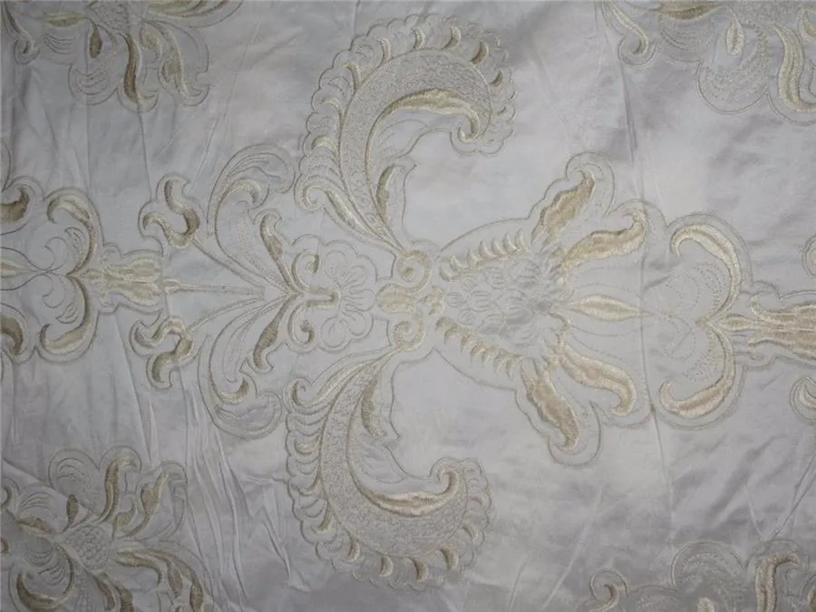 SILK DUPIONI EMBROIDERY REVERSABLE IVORY AND BLACK AND IVORY AND CREAM 54" wide DUP#E12